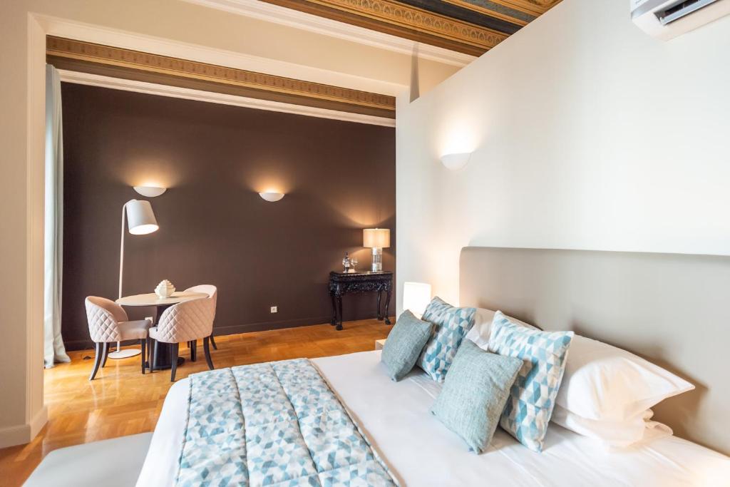 Posteľ alebo postele v izbe v ubytovaní 33SolonosSuites