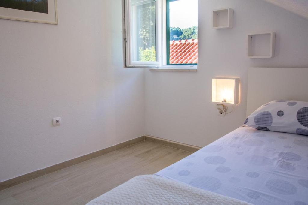 Postel nebo postele na pokoji v ubytování Apartment Ma_Lu
