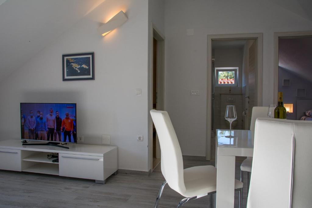 TV a/nebo společenská místnost v ubytování Apartment Ma_Lu