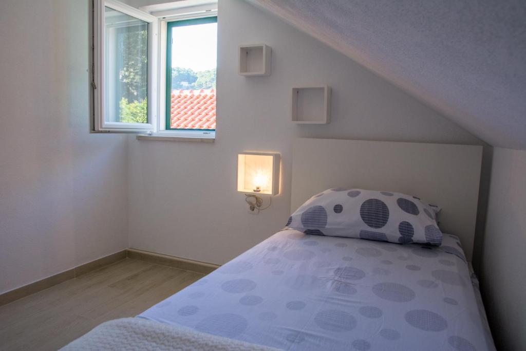Postel nebo postele na pokoji v ubytování Apartment Ma_Lu