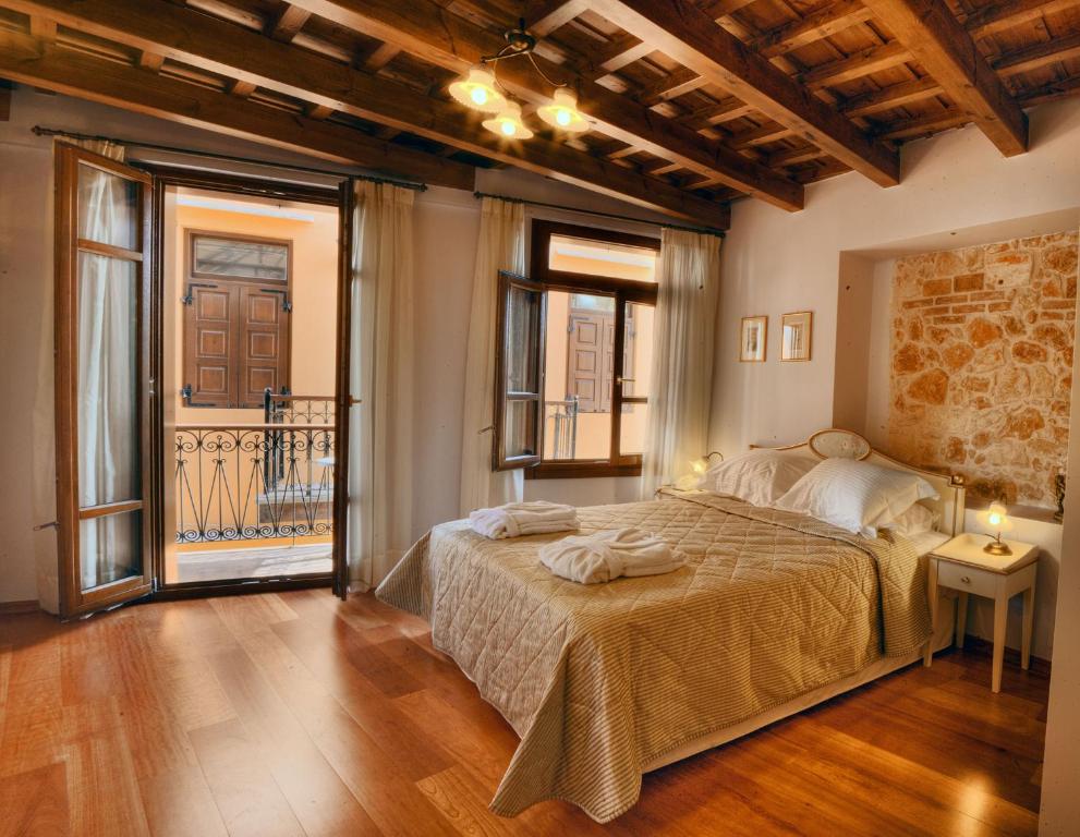 Postel nebo postele na pokoji v ubytování Palazzo Duca