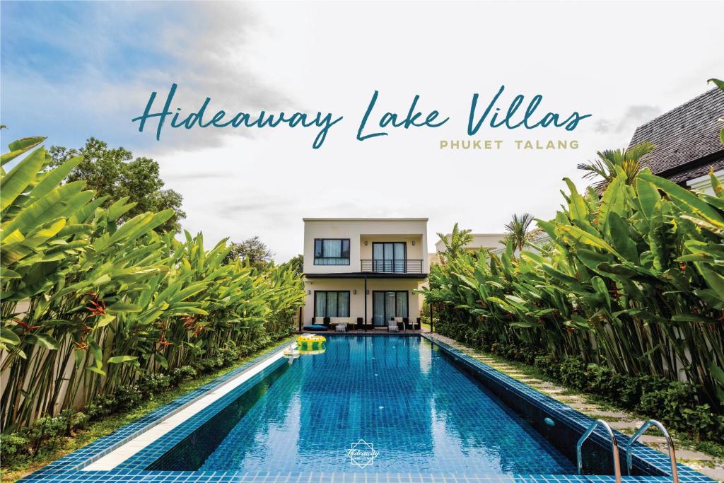 Ban Phru ChampaにあるHideaway Lake Villas By Cozy Lakeのリゾート内のスイミングプール付きのヴィラ