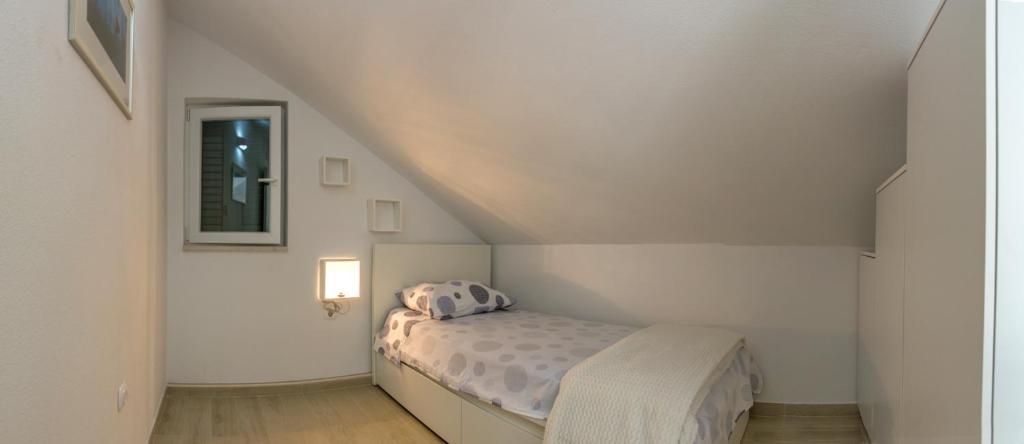 Postel nebo postele na pokoji v ubytování Apartment Ma_Lu