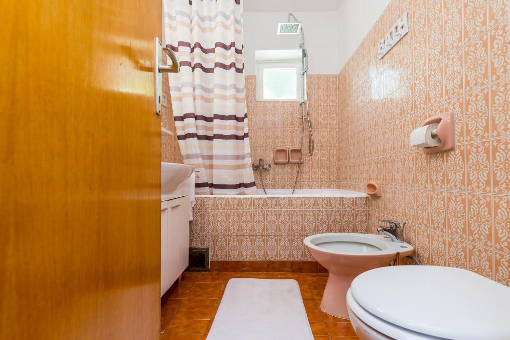 Kúpeľňa v ubytovaní Apartment Valonija