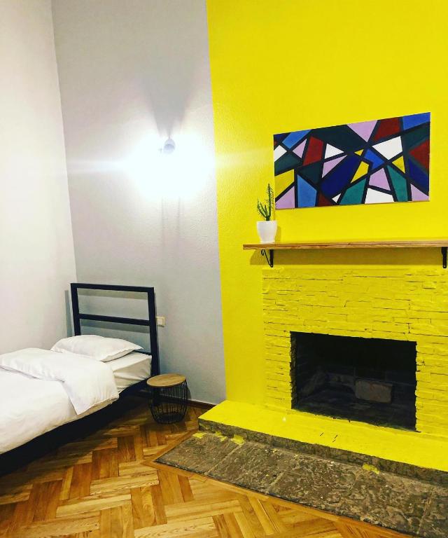 Postel nebo postele na pokoji v ubytování Red Door