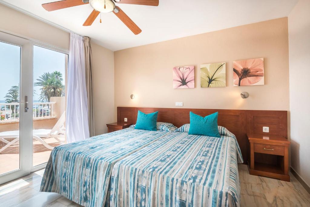 Postel nebo postele na pokoji v ubytování Apartamentos Vista Sur