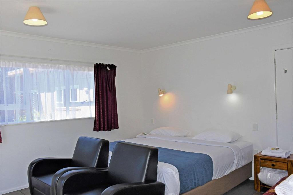 Postel nebo postele na pokoji v ubytování Comfort Inn Westshore Beach