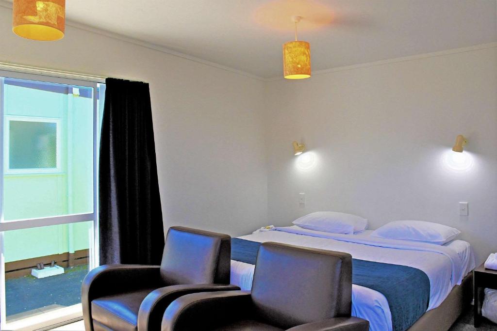 Postel nebo postele na pokoji v ubytování Comfort Inn Westshore Beach