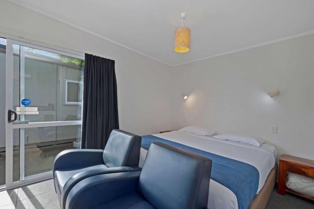 Postel nebo postele na pokoji v ubytování Comfort Inn Westshore Beach