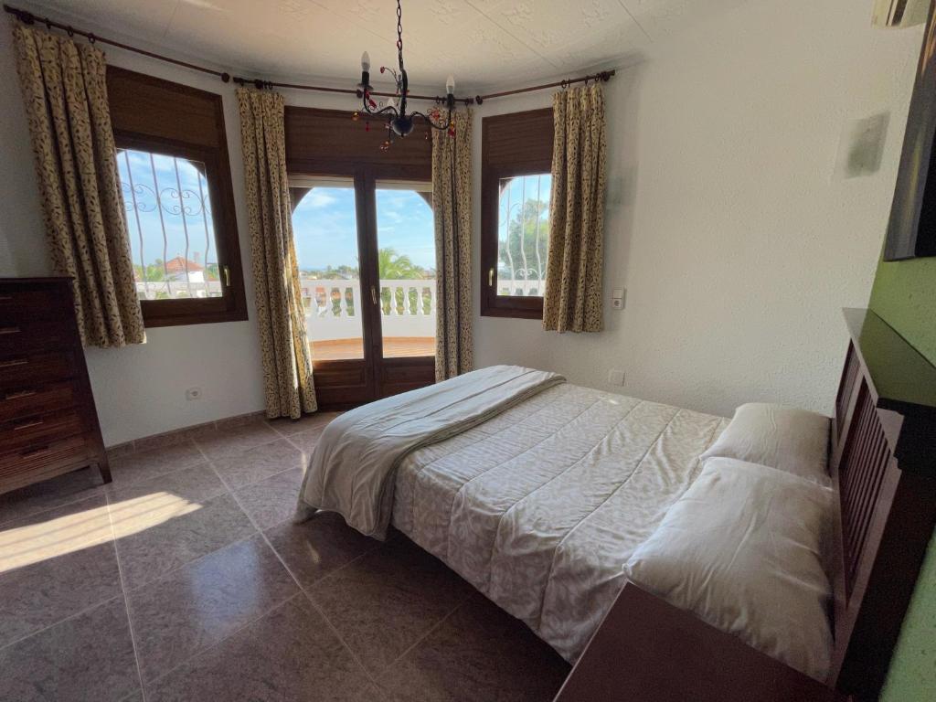 Posteľ alebo postele v izbe v ubytovaní Arenda villa VERACRUZ Miami Playa