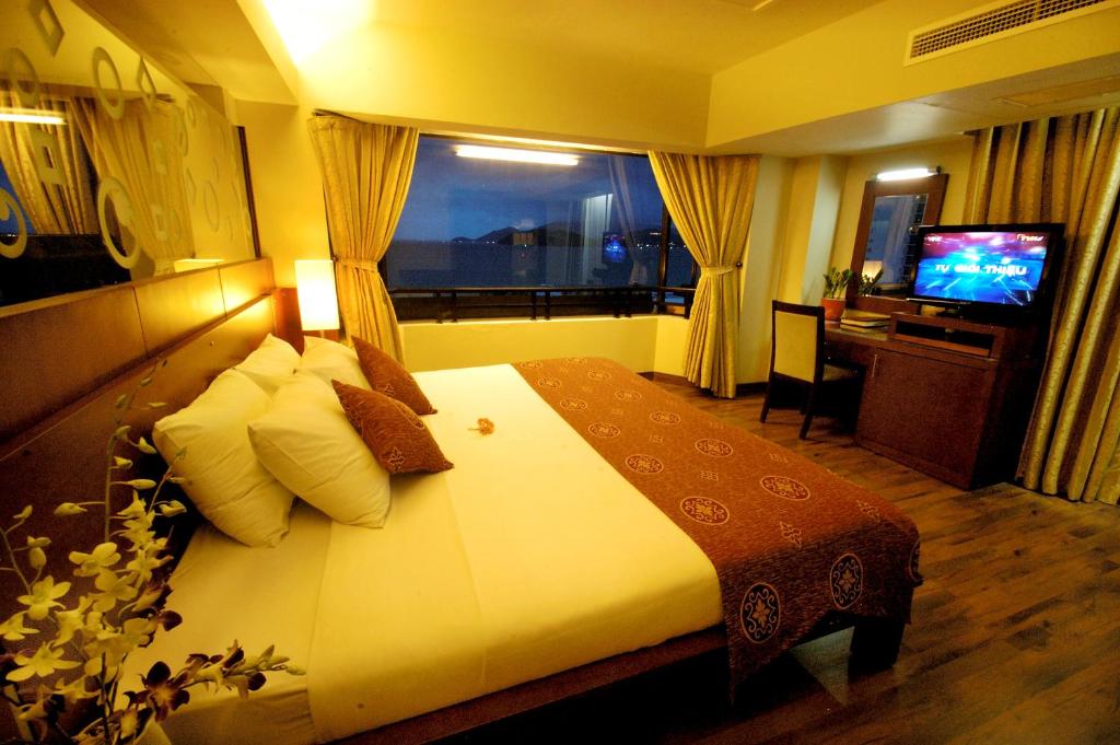 TV a/nebo společenská místnost v ubytování Asia Paradise Hotel