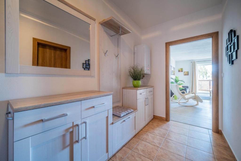 Kuchyň nebo kuchyňský kout v ubytování Apartmán Verča Riviera Lipno 510