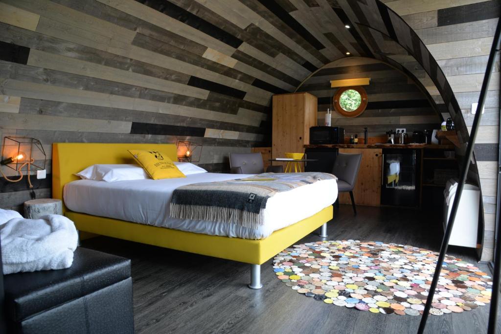 Postel nebo postele na pokoji v ubytování Lodges des grands crus