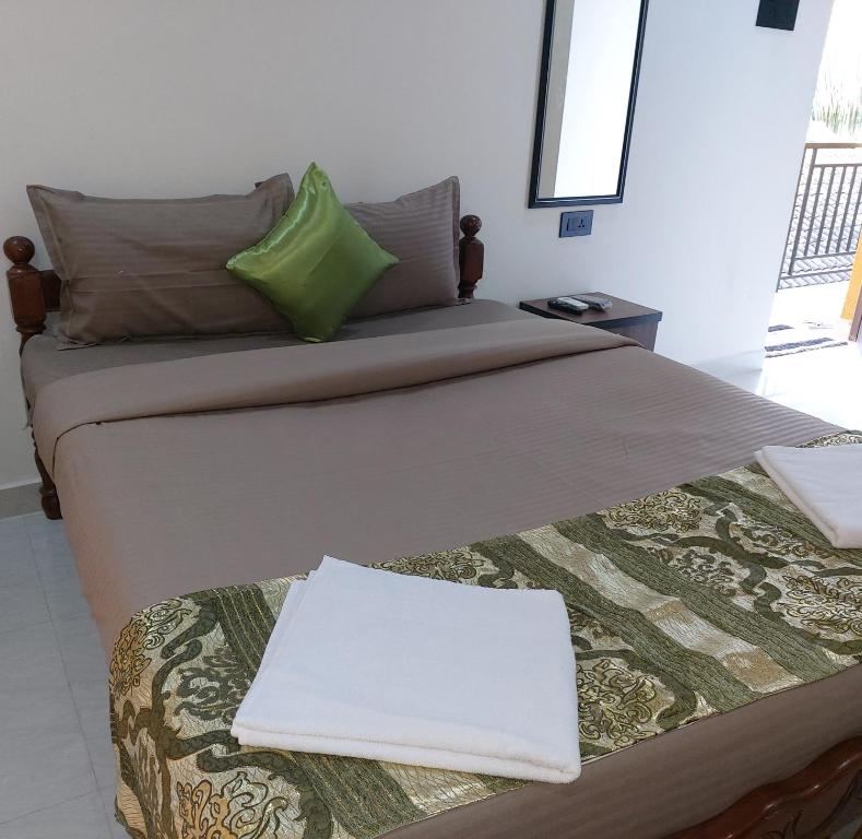 Postel nebo postele na pokoji v ubytování ULTIMATE STAY