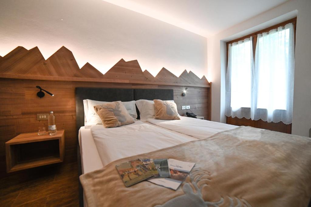 Postel nebo postele na pokoji v ubytování Albergo Sporting