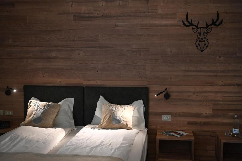 Postel nebo postele na pokoji v ubytování Albergo Sporting