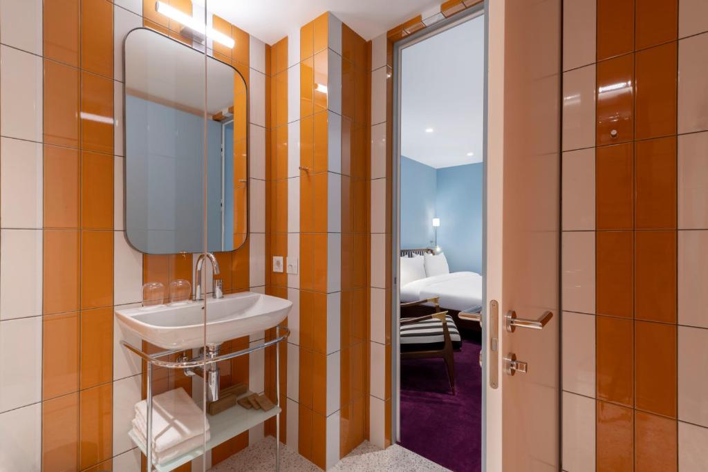 Postel nebo postele na pokoji v ubytování Bazzar Boutique Hotel