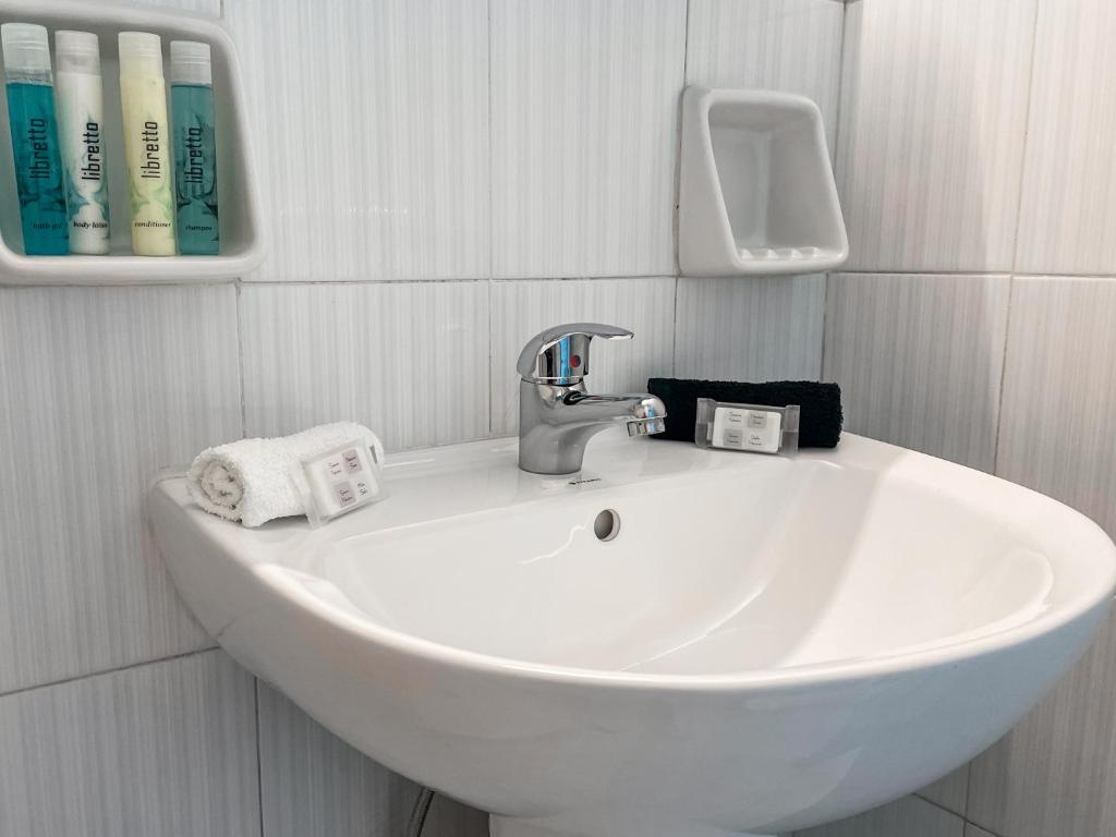 Koupelna v ubytování Stratos Hotel
