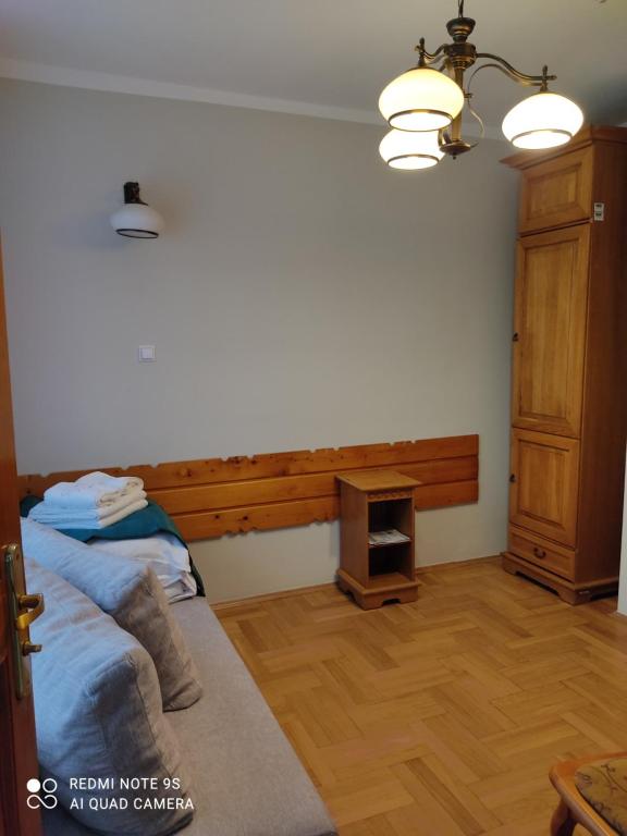 Posteľ alebo postele v izbe v ubytovaní Pokoje Gościnne Zakopane
