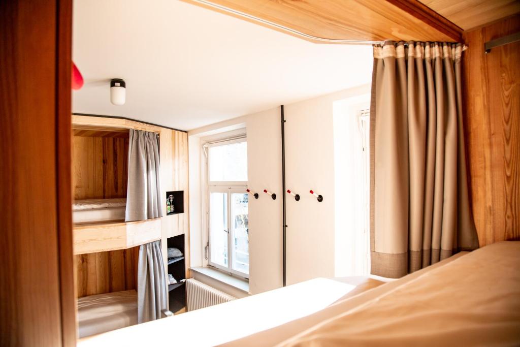Voodi või voodid majutusasutuse St Josefsheim Hostel toas