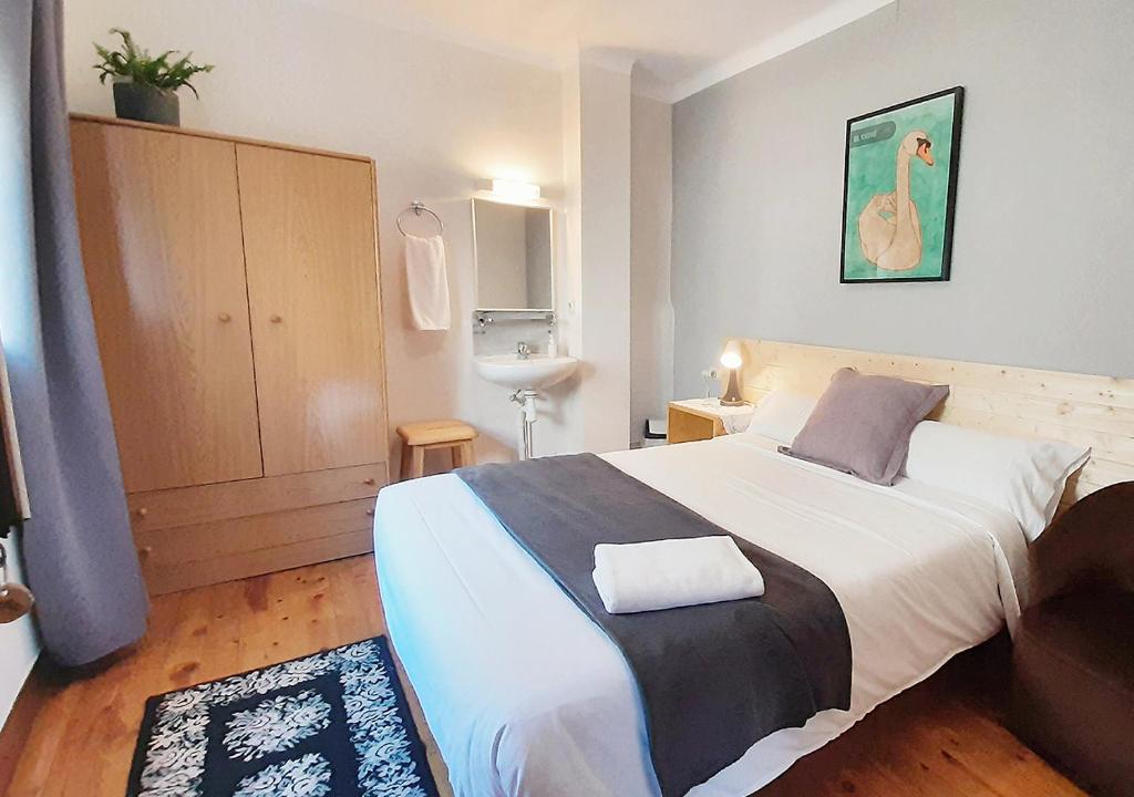 Postel nebo postele na pokoji v ubytování Hostal Fonda Prat