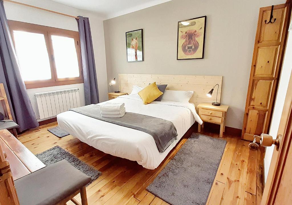 Postel nebo postele na pokoji v ubytování Hostal Fonda Prat