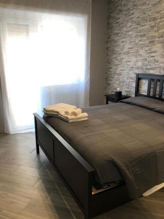 Letto o letti in una camera di LA LOGGIA