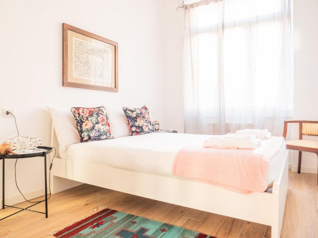 Posteľ alebo postele v izbe v ubytovaní The Best Rent - Apartment close to Porta Romana