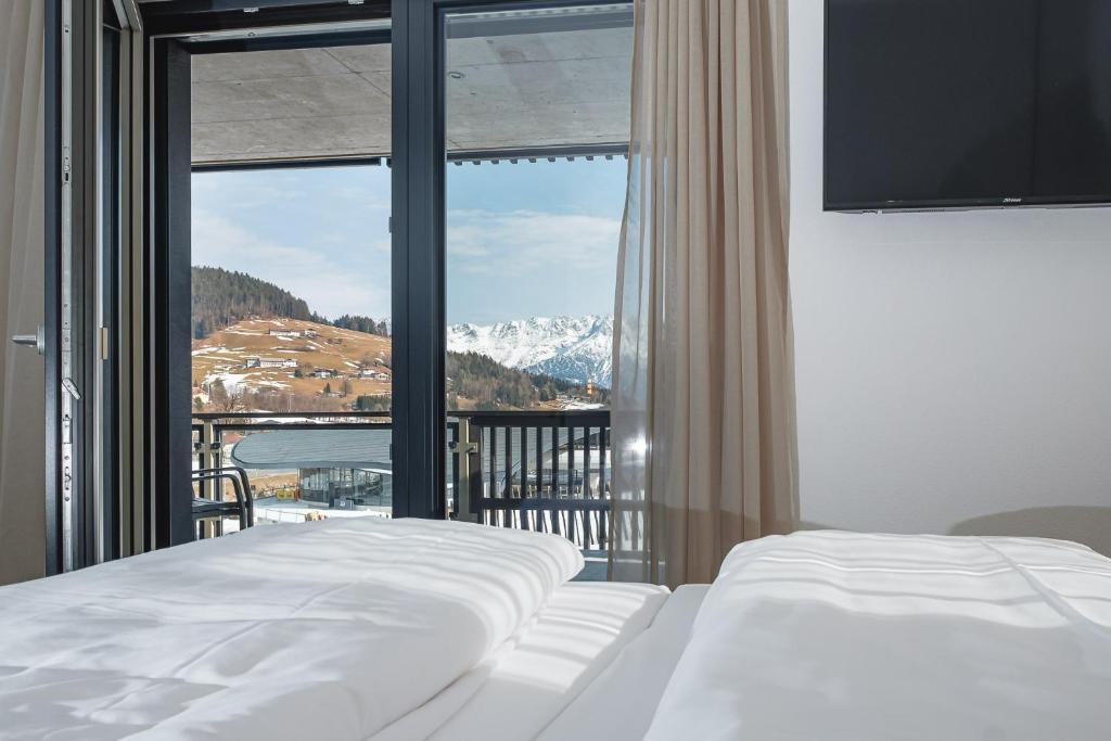 Posteľ alebo postele v izbe v ubytovaní APART HERZOG - URBAN LUXURY LIFESTYLE direct at Steinbergpiste and Steinbergbahn