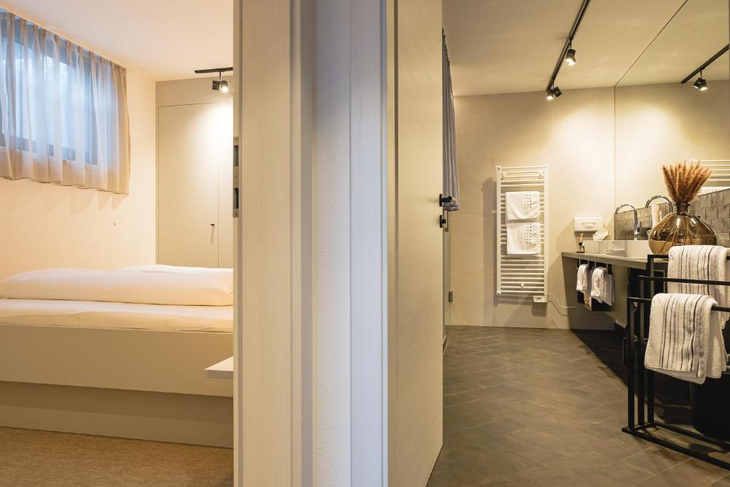 Posteľ alebo postele v izbe v ubytovaní APART HERZOG - URBAN LUXURY LIFESTYLE direct at Steinbergpiste and Steinbergbahn