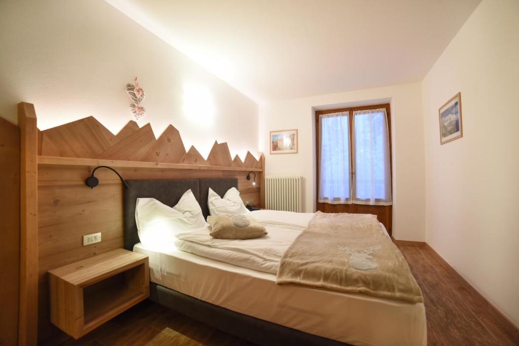 Postel nebo postele na pokoji v ubytování Albergo Sporting