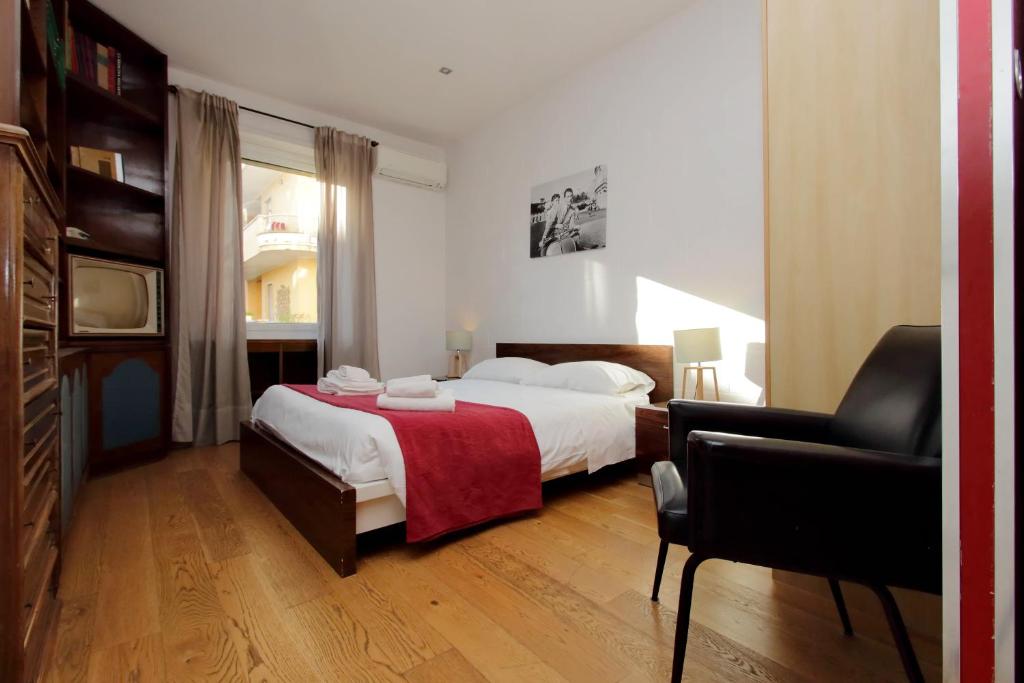 Łóżko lub łóżka w pokoju w obiekcie Trastevere