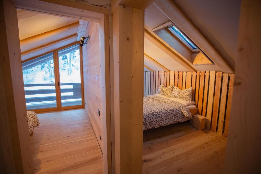 Posteľ alebo postele v izbe v ubytovaní Lärchenwirt Dolomites