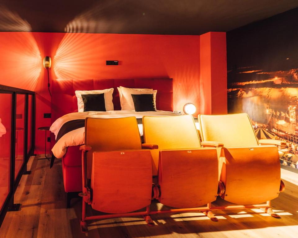 Postel nebo postele na pokoji v ubytování Oldschool Hotel