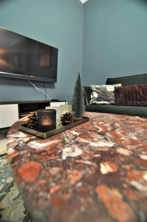 TV a/nebo společenská místnost v ubytování Zennova #4 Vintage City Center Apt