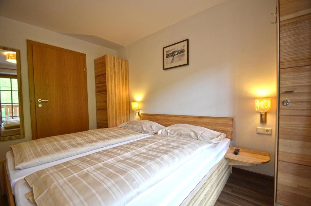 Posteľ alebo postele v izbe v ubytovaní Appartementhaus Kristall incl Joker Card by All in One Apartments