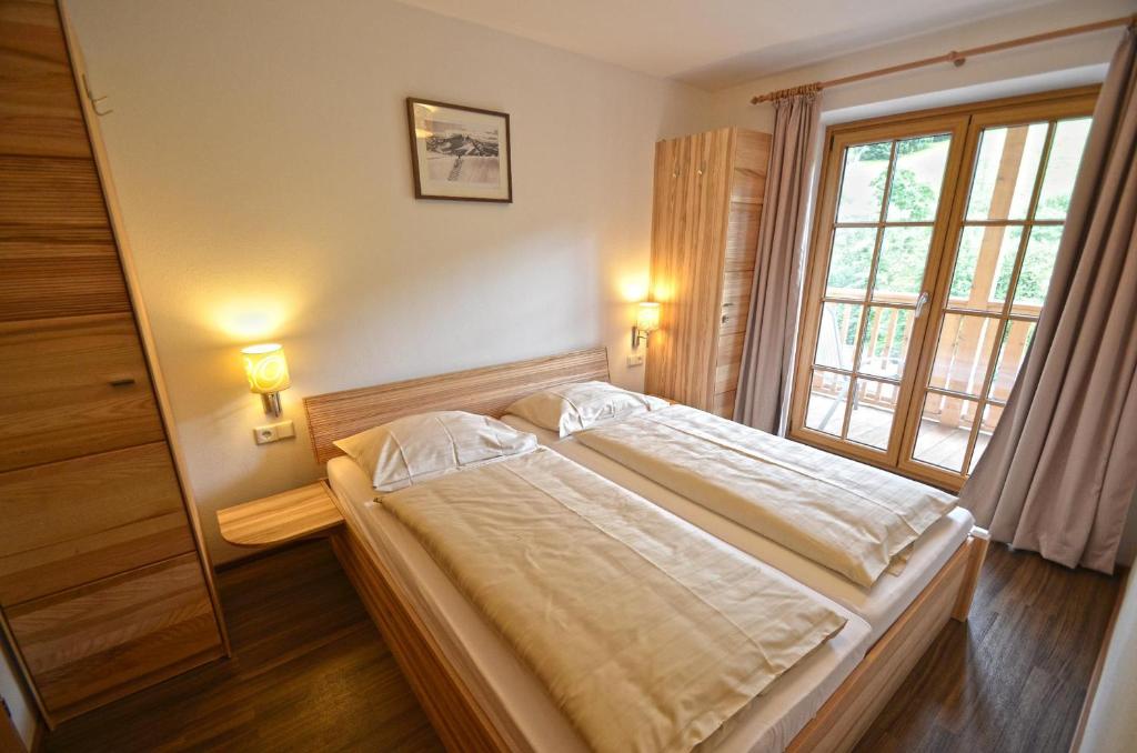 Posteľ alebo postele v izbe v ubytovaní Appartementhaus Kristall incl Joker Card by All in One Apartments