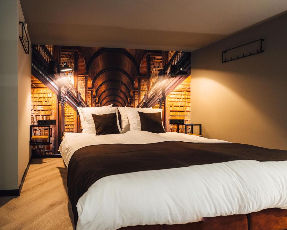 Postel nebo postele na pokoji v ubytování Oldschool Hotel