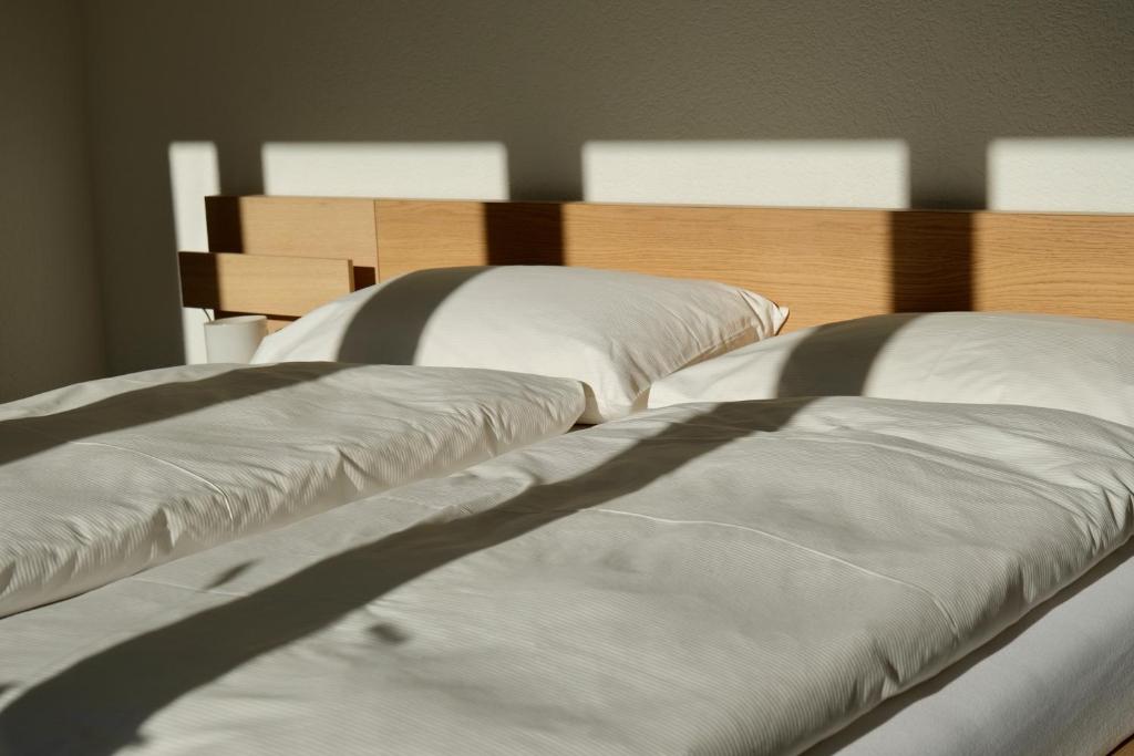 Postel nebo postele na pokoji v ubytování Hôtel Oasis