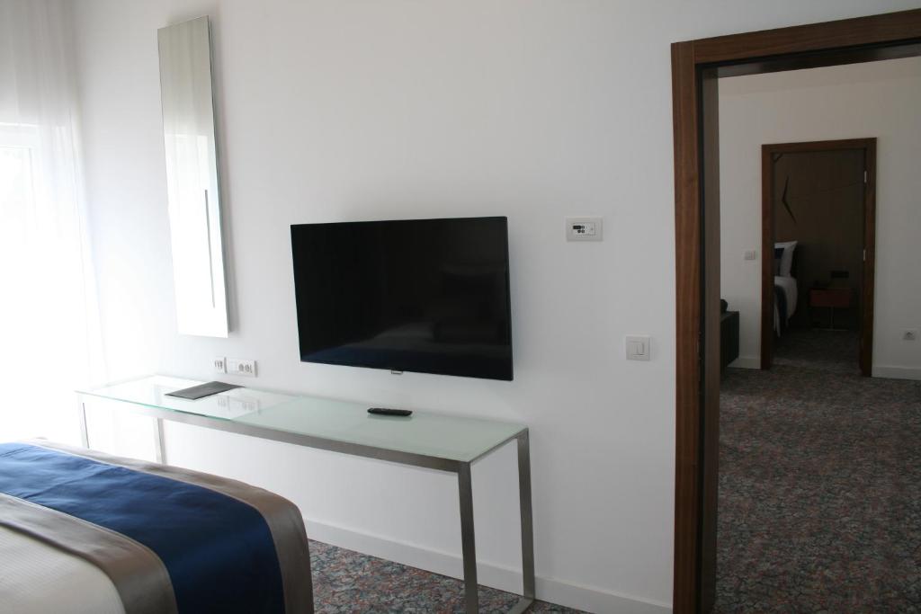 TV a/nebo společenská místnost v ubytování Hotel Austria & Bosna
