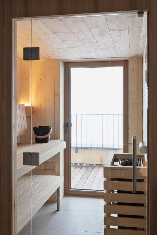Letto o letti in una camera di Holzhackerin - the charming Haus am Berg