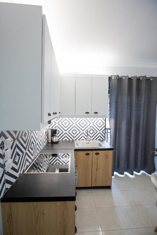 Kuchyň nebo kuchyňský kout v ubytování Casa in Centro