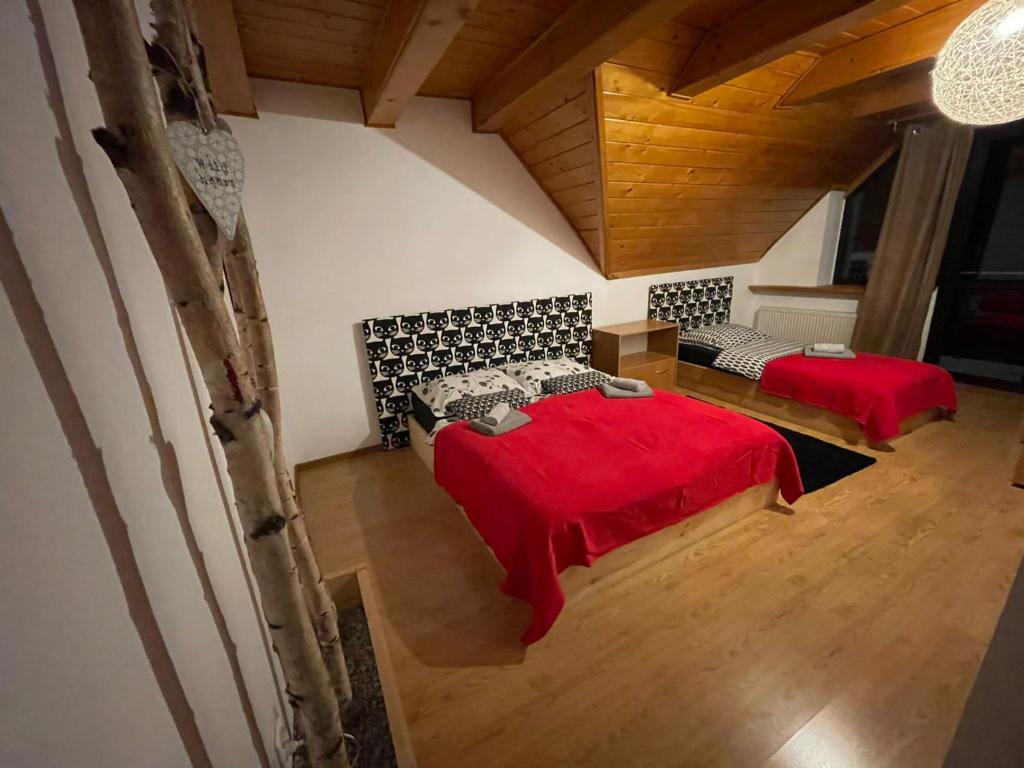 Postel nebo postele na pokoji v ubytování Willa Brzozówka