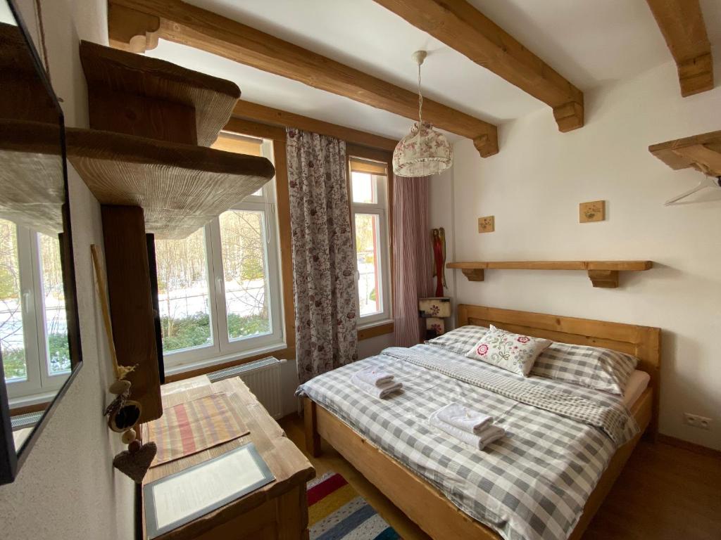 Postel nebo postele na pokoji v ubytování Apartmany Moravienka