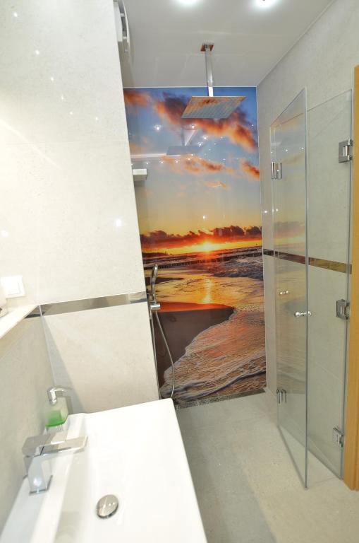 Kúpeľňa v ubytovaní Apartament Piaskowy Jantar 2