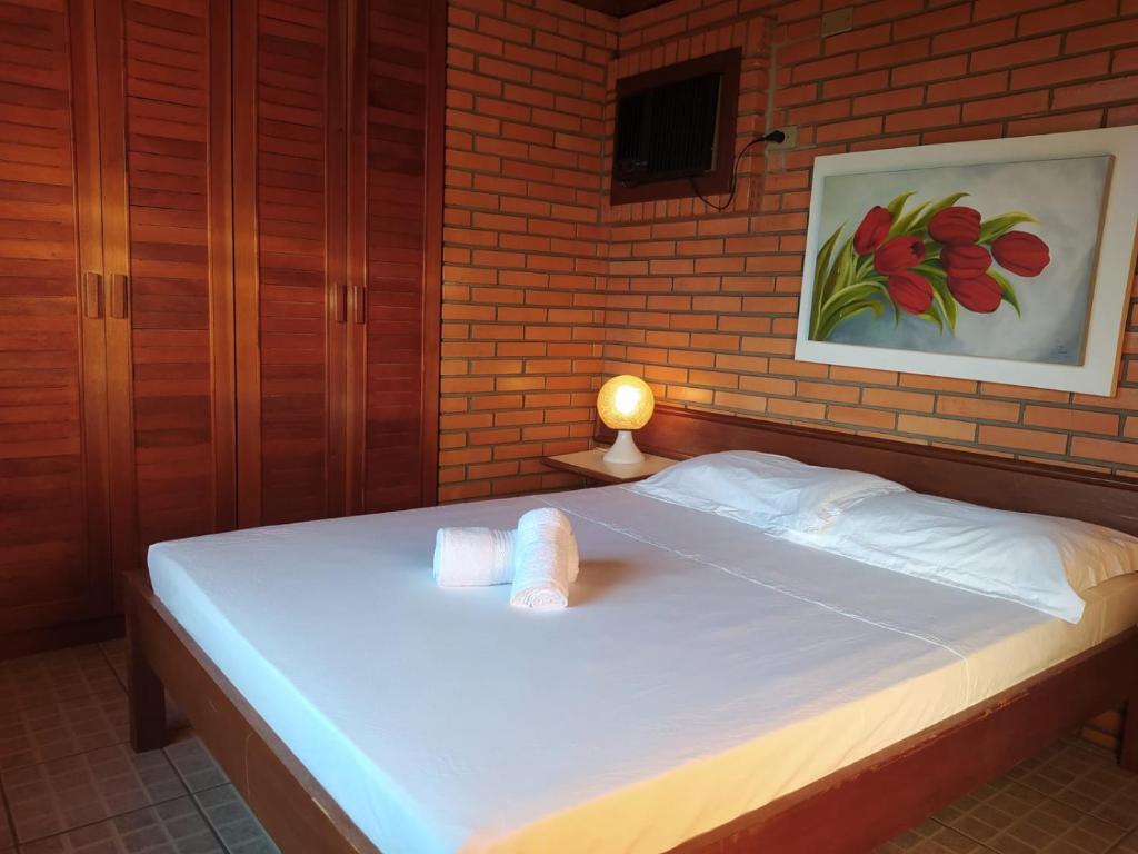 Кровать или кровати в номере Condomínio Vereda Tropical - Casa 2