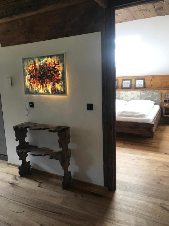 A bed or beds in a room at Grieshof am Pühel