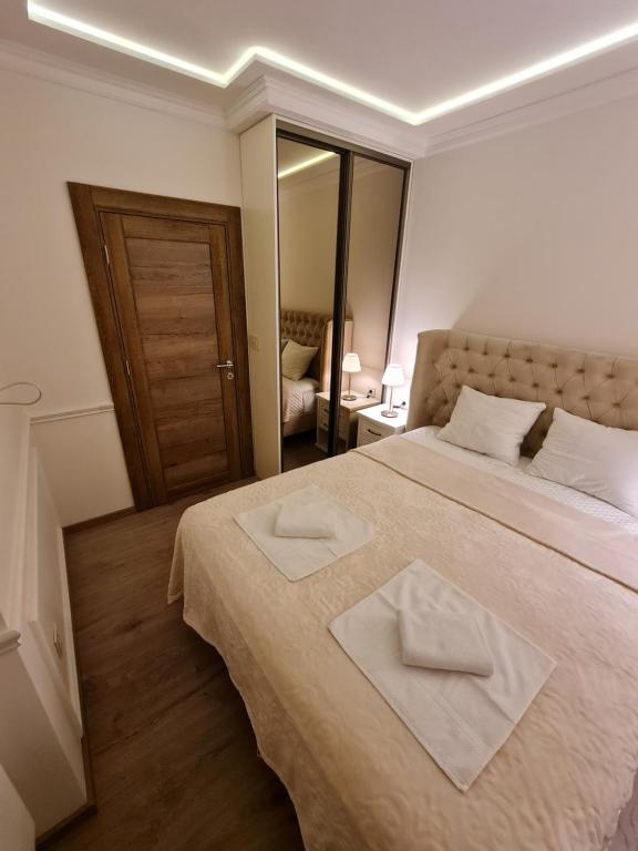 Giường trong phòng chung tại Apartment Nusic residence