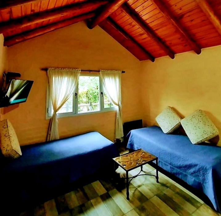 Katil atau katil-katil dalam bilik di Cabañas Wanla