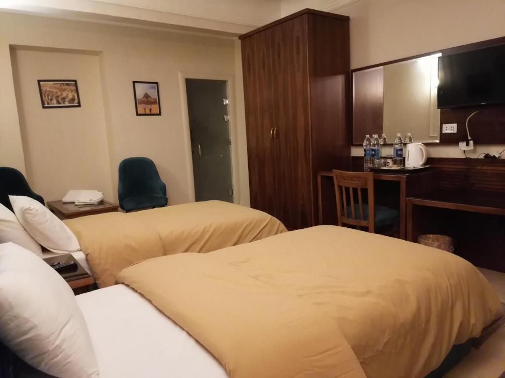 Katil atau katil-katil dalam bilik di Rihana pyramids hotel